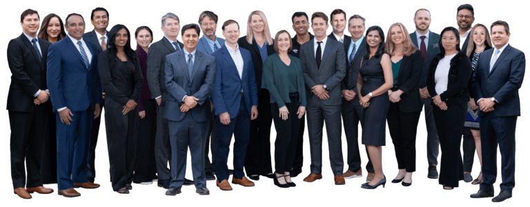 Florida Eye Specialists stand and smile as a group