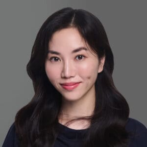 Headshot of Irene T. Lee, M.D. in professional wear with a grey background.