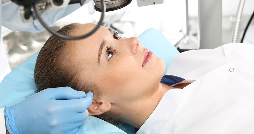 A patient in the operating room during ophthalmic surgery