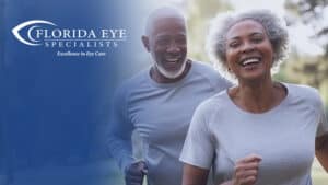 Couple smiling while jogging. The image has a blue shadow overlay with the Florida Eye Specialists logo in the top left corner.